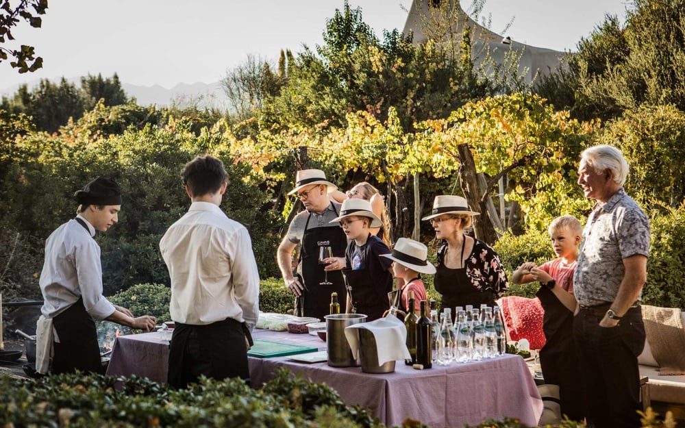 A family enjoy a wine and food experience at Cavas Wine Lodge in Argentina.