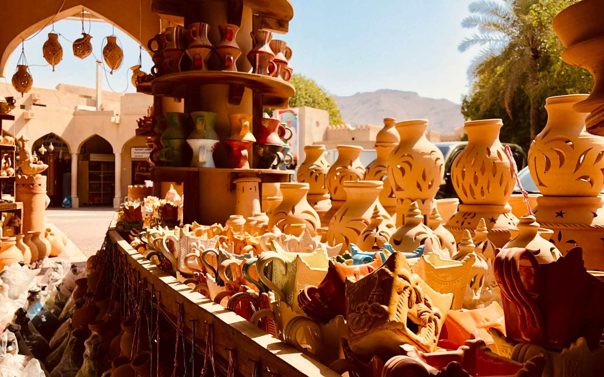 The Nizwa Souk sells many hand-made crafts like lamps and clothing items.