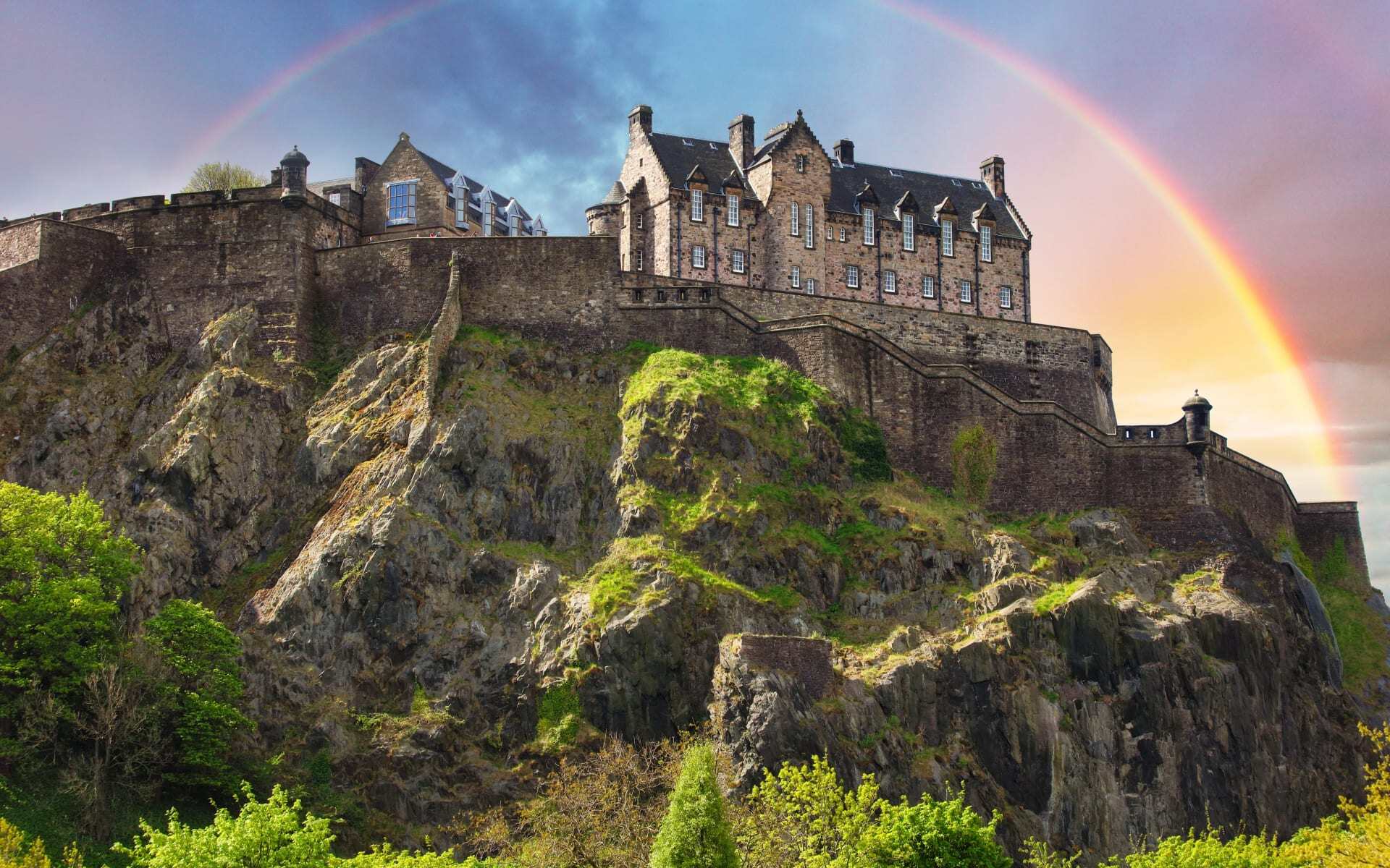 Edinburgh Castle is framed by a rainbow on an autumn's day.