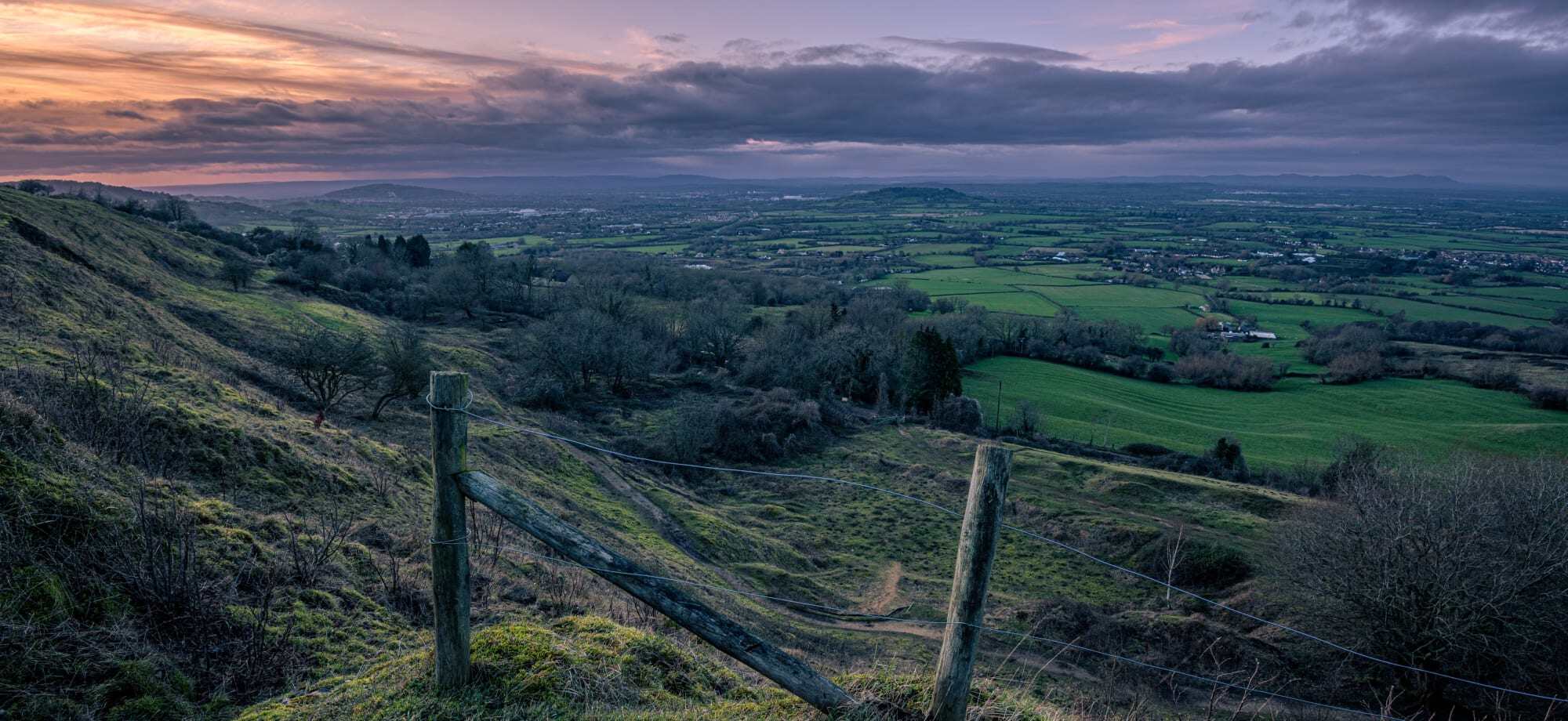 The Cotswolds has rolling hillsides and farmland.