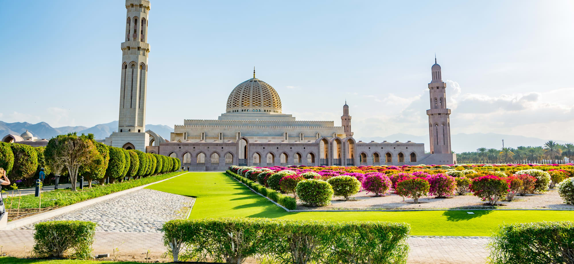 The mosque in Muscat dazzles during a bright, sunny day