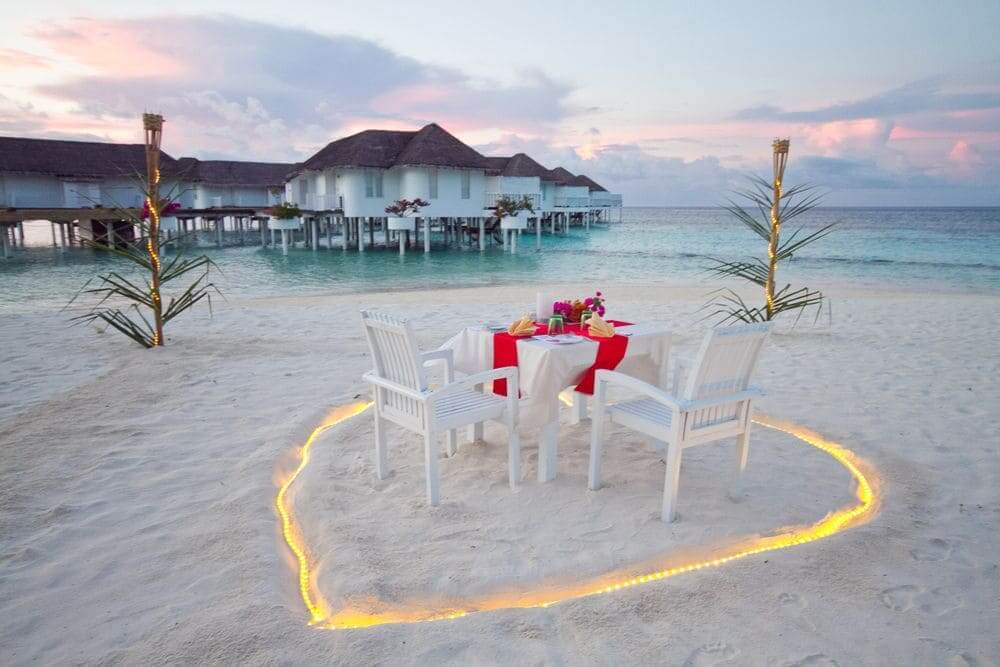 romantic private candelit dinner on the beach in the maldives