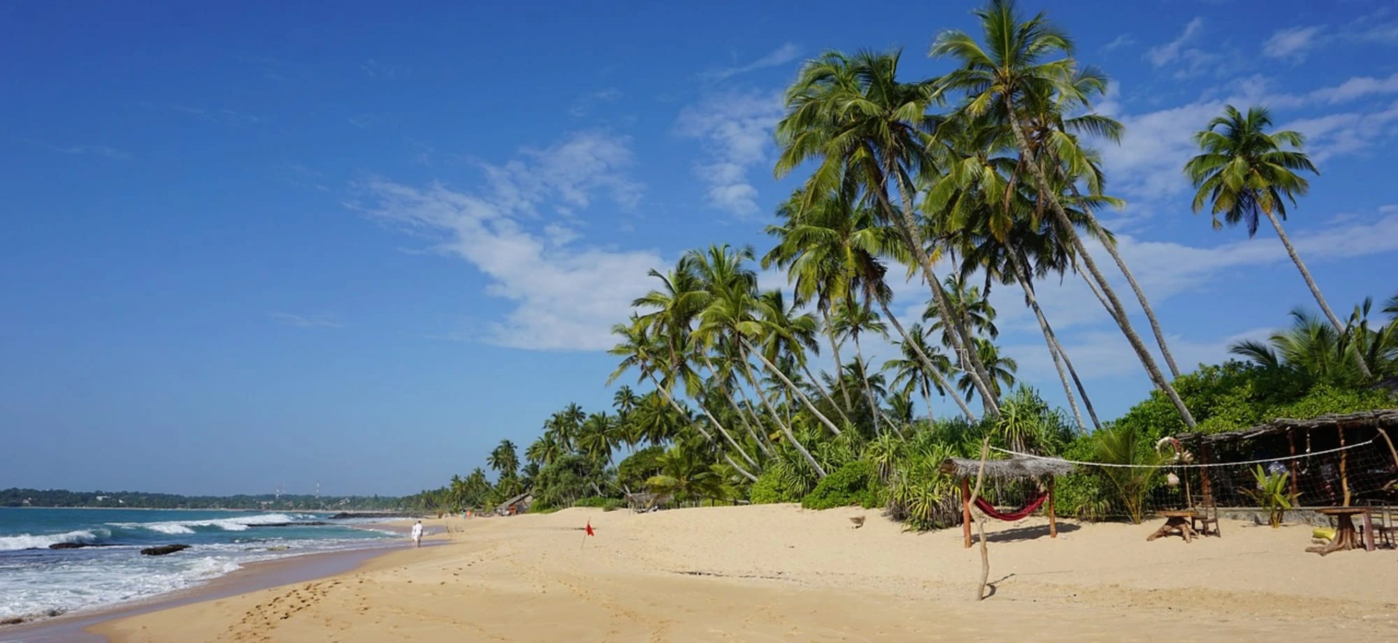 Tangalle_Sri_Lanka_Beach_Unsplash_cc_Maxos_Dim_nrr1lq